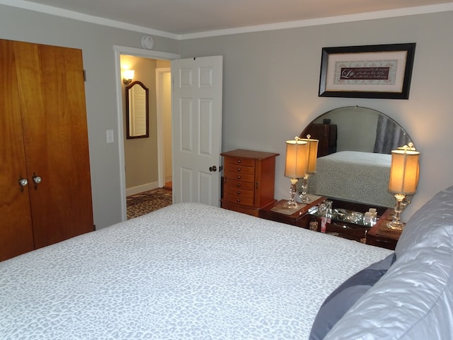 bedroom with ornamental molding