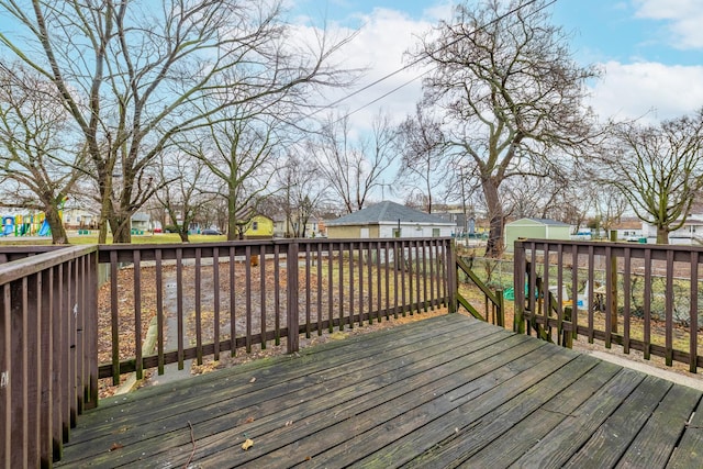 wooden terrace with a residential view