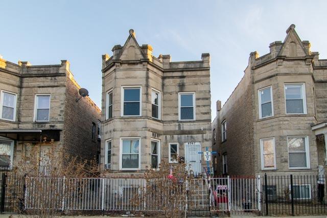 view of property featuring fence