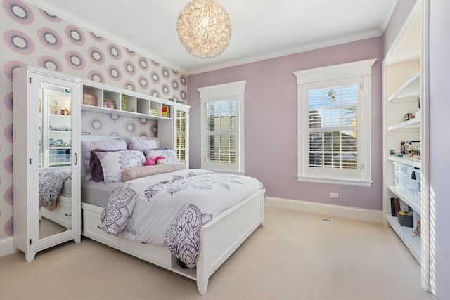 bedroom featuring light carpet, baseboards, and crown molding