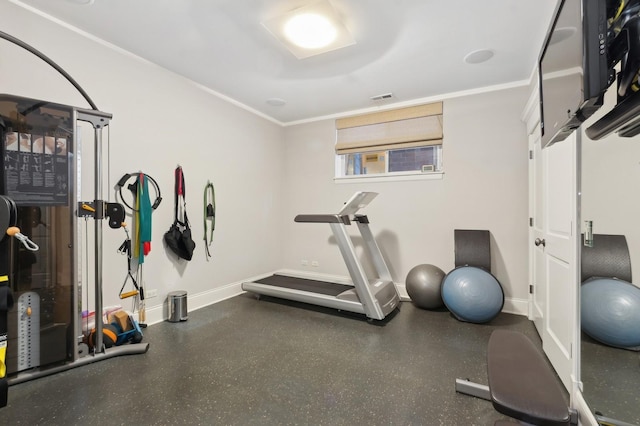 workout room with crown molding, visible vents, and baseboards