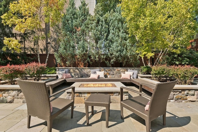 view of patio featuring a fire pit