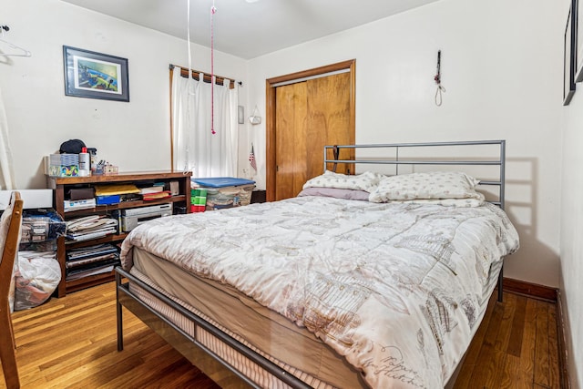 bedroom featuring wood finished floors