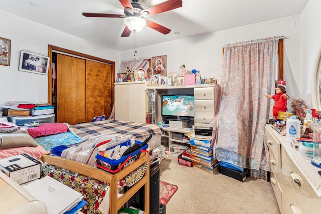 bedroom featuring a closet and ceiling fan