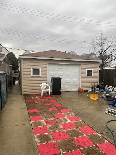 detached garage with fence