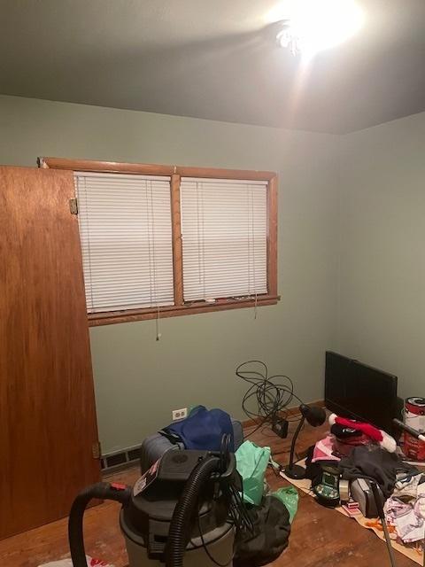 bedroom with visible vents