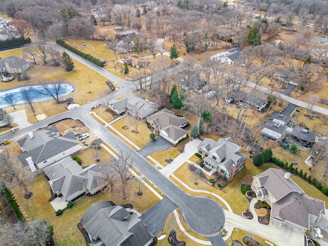 birds eye view of property with a residential view