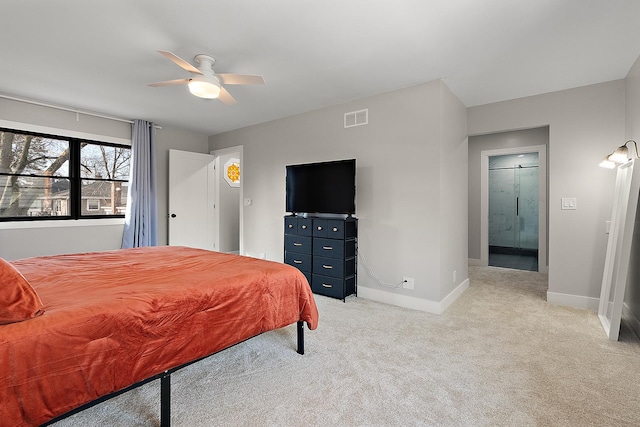 bedroom with light colored carpet, baseboards, visible vents, and a ceiling fan