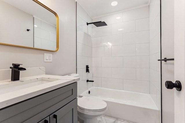 bathroom with marble finish floor, vanity, toilet, and shower / tub combination