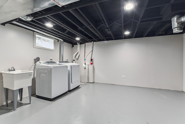 washroom featuring laundry area and washing machine and clothes dryer