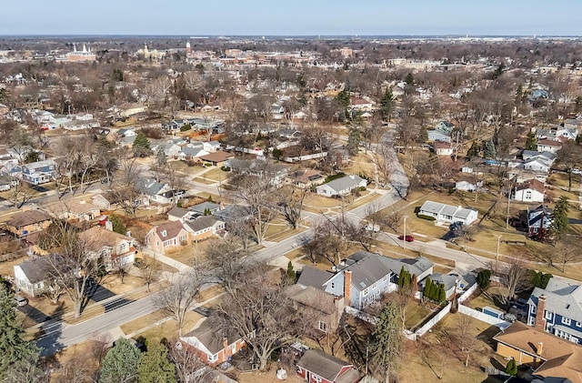 birds eye view of property with a residential view