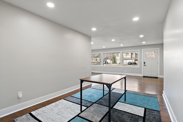 office space with recessed lighting, baseboards, and dark wood-style flooring