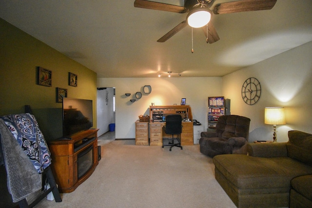 living room with carpet and ceiling fan