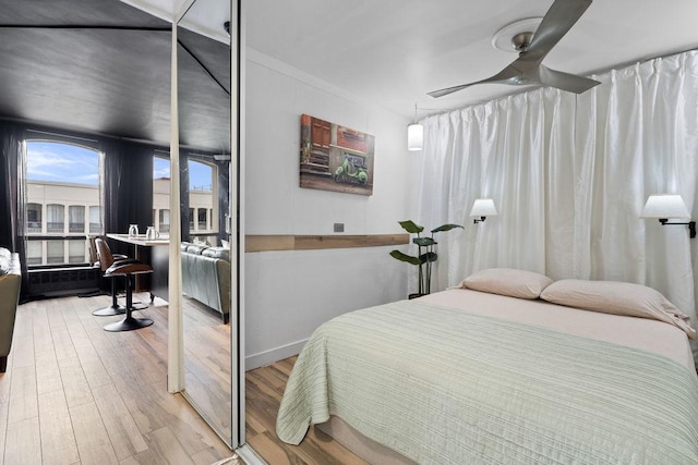 bedroom featuring wood finished floors