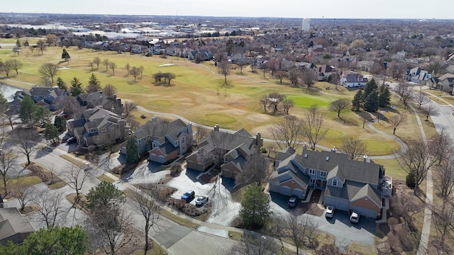 birds eye view of property with a residential view and golf course view