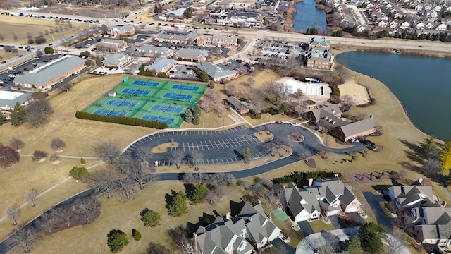 aerial view featuring a water view and a residential view