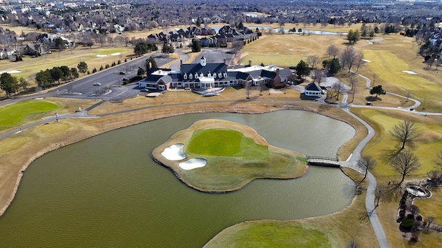 bird's eye view featuring a water view and a residential view