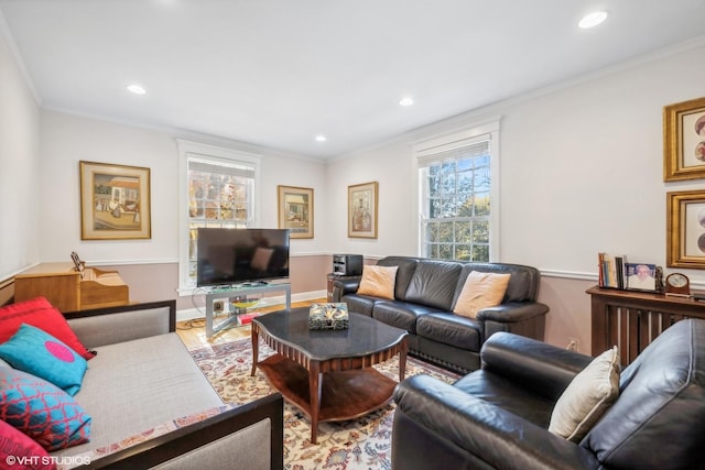 living area featuring ornamental molding, a wealth of natural light, and recessed lighting