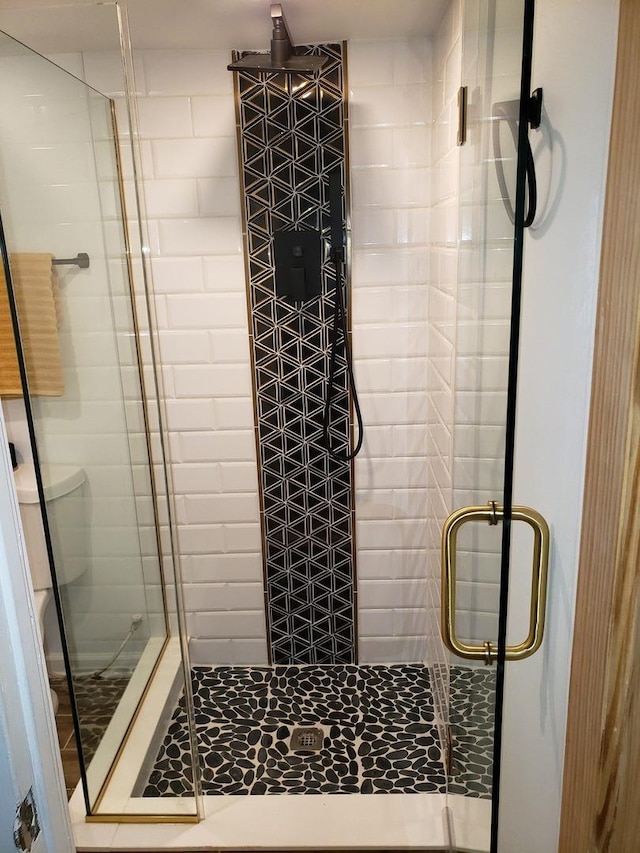 bathroom with a stall shower