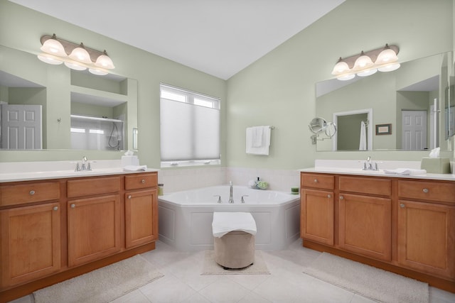 full bath with vaulted ceiling, a bath, a stall shower, and a sink