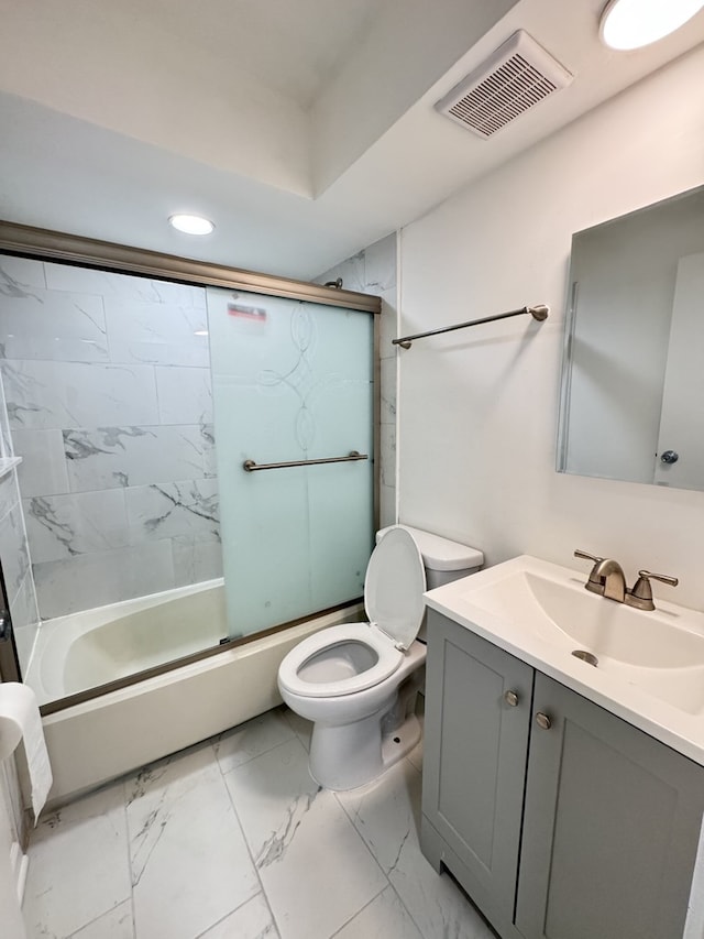 full bath with marble finish floor, bath / shower combo with glass door, visible vents, toilet, and vanity