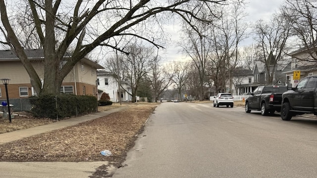 view of road featuring sidewalks and a residential view