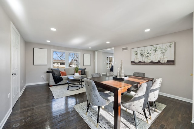 dining space with recessed lighting, visible vents, baseboards, and wood finished floors