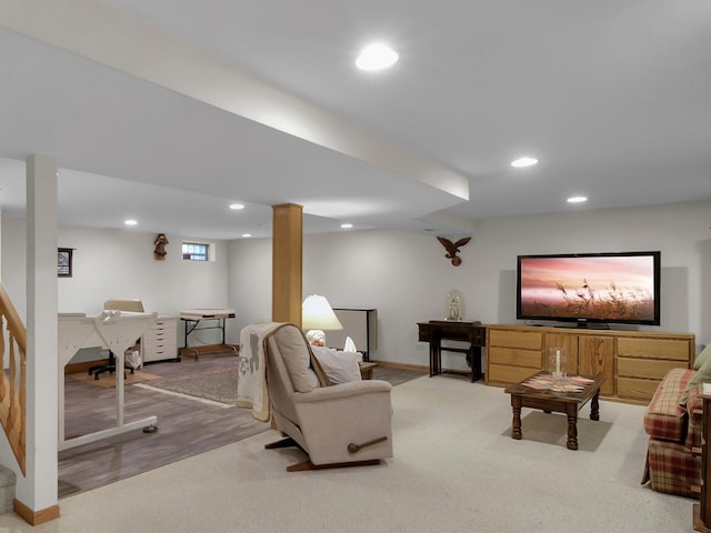 carpeted living room with recessed lighting, stairway, and baseboards