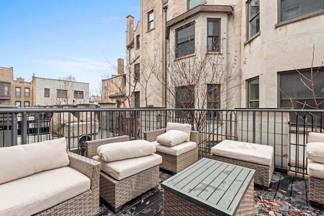 balcony with an outdoor hangout area