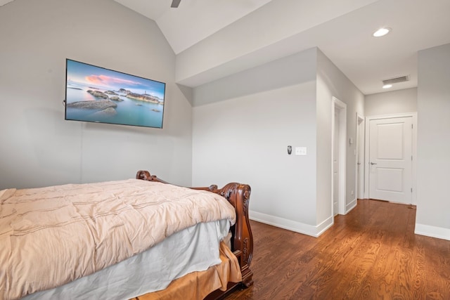 bedroom featuring recessed lighting, wood finished floors, visible vents, baseboards, and vaulted ceiling