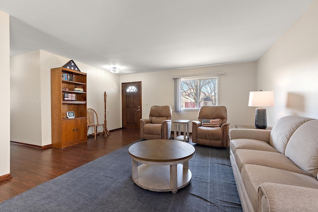 living area with dark wood-style floors and baseboards