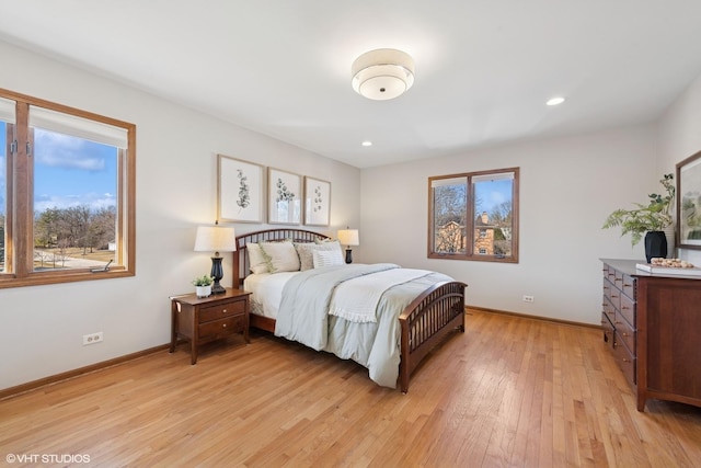 bedroom with recessed lighting, baseboards, and light wood-style floors