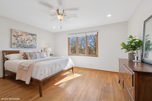 bedroom with recessed lighting, baseboards, and light wood finished floors