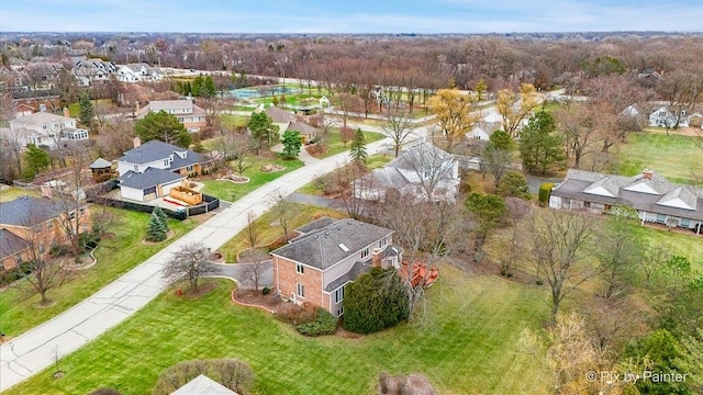 birds eye view of property with a residential view