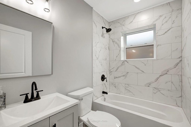 full bath featuring bathtub / shower combination, vanity, and toilet