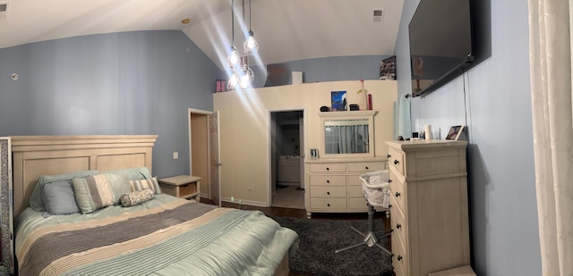 bedroom with visible vents and vaulted ceiling