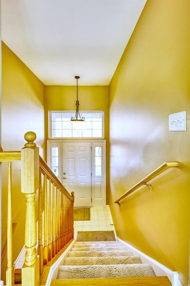 stairway with baseboards