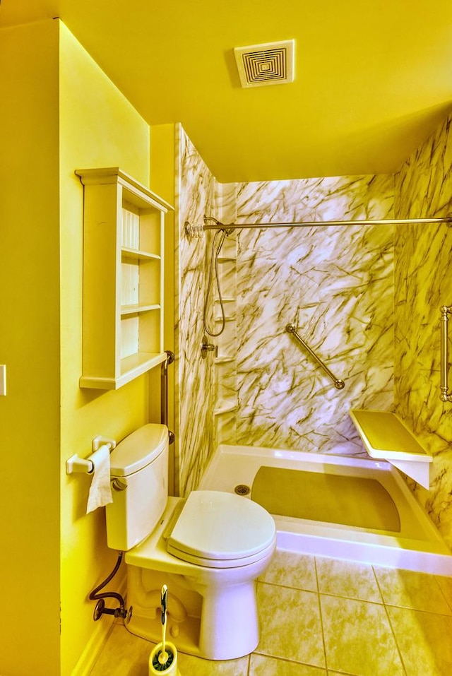 full bathroom featuring tile patterned flooring, visible vents, toilet, and a shower