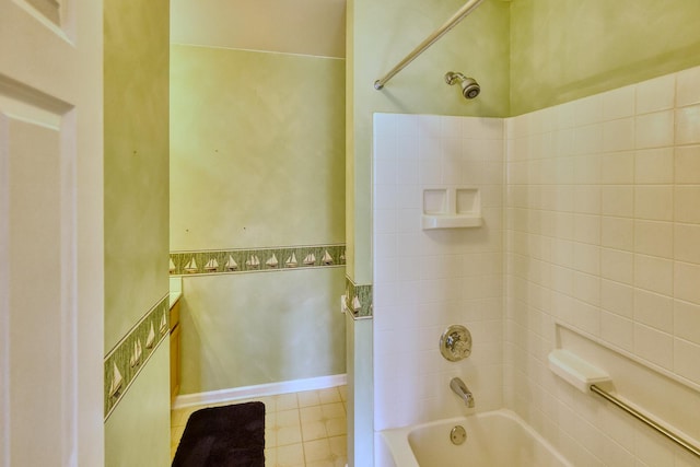 full bath featuring bathtub / shower combination and baseboards