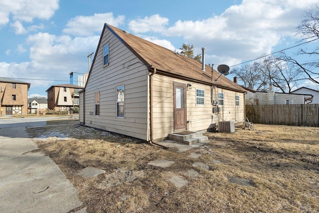 exterior space with entry steps and fence