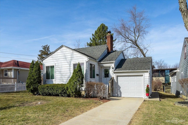 view of front of property with a front lawn, fence, a chimney, a garage, and driveway