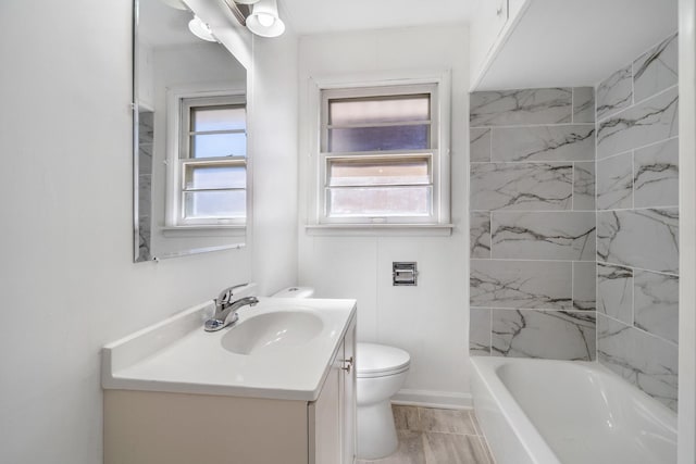 bathroom with toilet and vanity