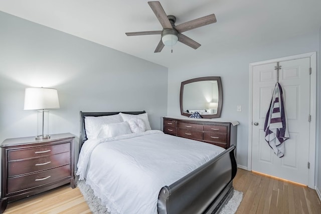 bedroom with ceiling fan and light wood finished floors