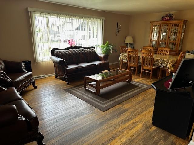 115 N Lavergne Ave, Northlake, IL 60164 - living room with wood finished floors and baseboards