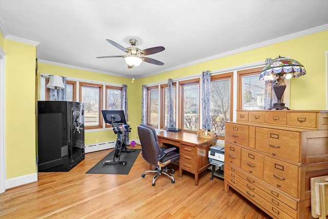 office area featuring baseboards, a baseboard radiator, ceiling fan, crown molding, and light wood-type flooring