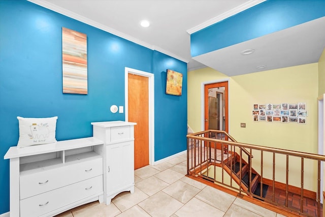 corridor with light tile patterned floors, baseboards, recessed lighting, ornamental molding, and an upstairs landing