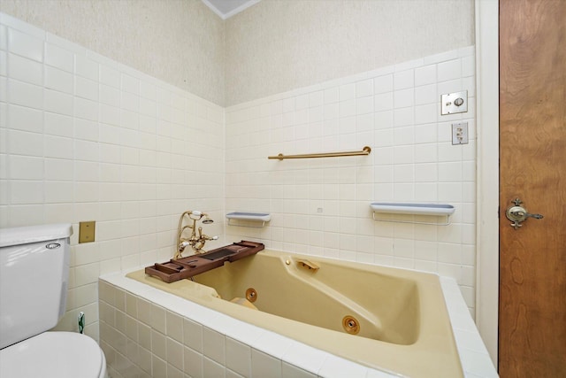 full bathroom featuring toilet, tile walls, and a whirlpool tub