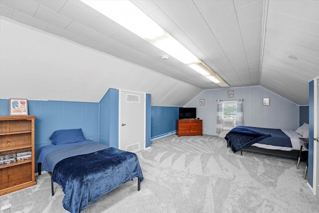 bedroom featuring vaulted ceiling, visible vents, a baseboard radiator, and carpet floors