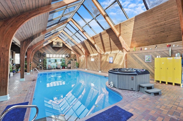 view of pool with a swimming pool and a skylight