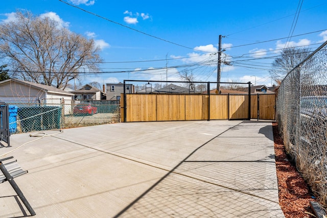 view of patio / terrace featuring a gate and fence